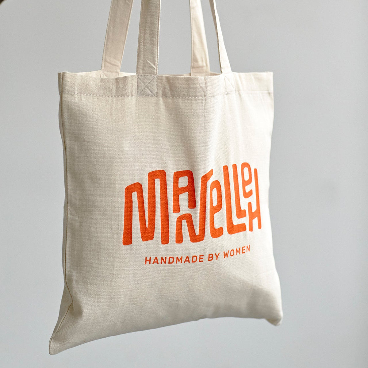 Manelleh mulepose (orange)
