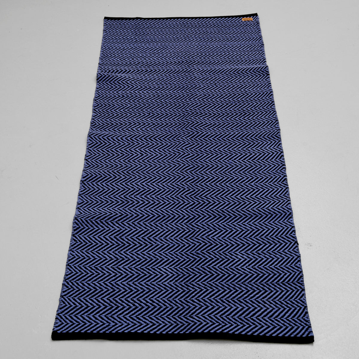 Løber 75x180 cm (zig-zag blå-sort)